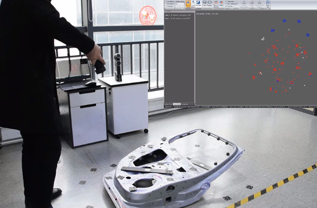 Photogrammetriesystem zum Erfassen von Bildern von Markierungen auf Teilen